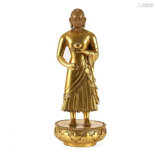 A GILT-BRONZE FIGURE OF SHAKYAMUNI