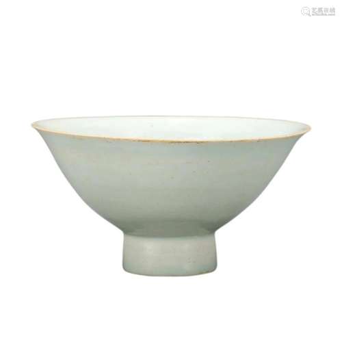 A WHITE-GLAZED BOWL