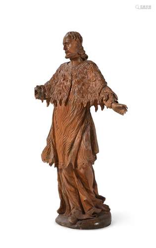 A CARVED LIMEWOOD FIGURE OF A STANDING APOSTOLIC FIGURE SWIS...