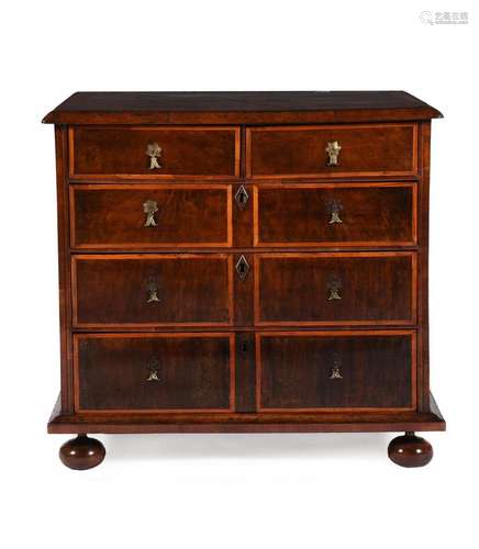 A WILLIAM III WALNUT AND HOLLY BANDED CHEST OF DRAWERS, CIRC...