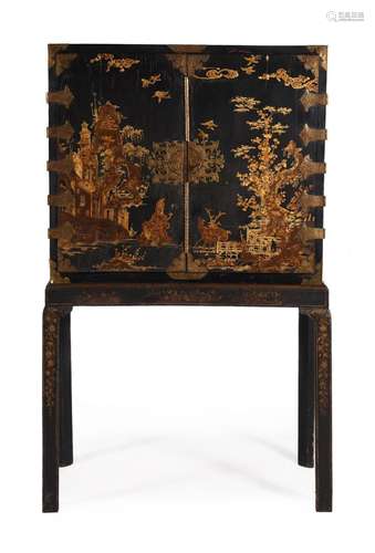 A WILLIAM & MARY BLACK LACQUER AND GILT JAPANNED CABINET...