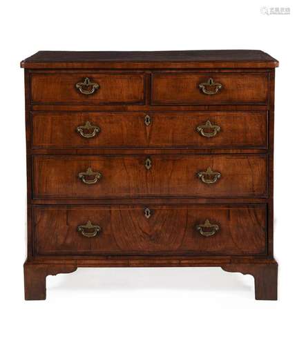 A GEORGE II FIGURED WALNUT, CROSSBANDED AND LINE INLAID CHES...