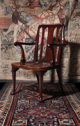 AN GEORGE II MAHOGANY HALL CHAIR, CIRCA 1730