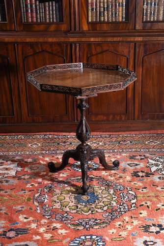 A CARVED MAHOGANY OCTAGONAL TRIPOD TABLE, CIRCA 1760 AND LAT...