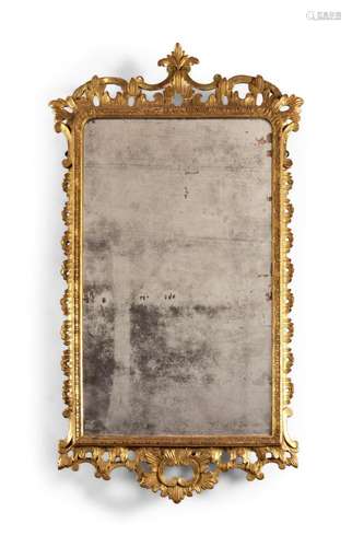 A GEORGE II CARVED GILTWOOD WALL MIRROR, CIRCA 1750