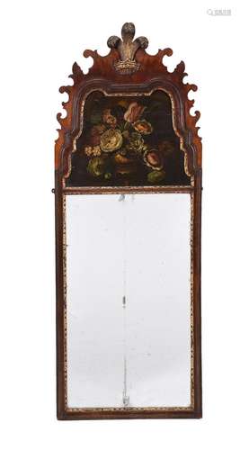 A GEORGE II WALNUT AND PARCEL GILT WALL MIRROR, CIRCA 1740