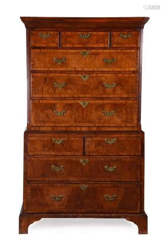 A GEORGE II WALNUT AND FEATHERBANDED CHEST ON CHEST, CIRCA 1...