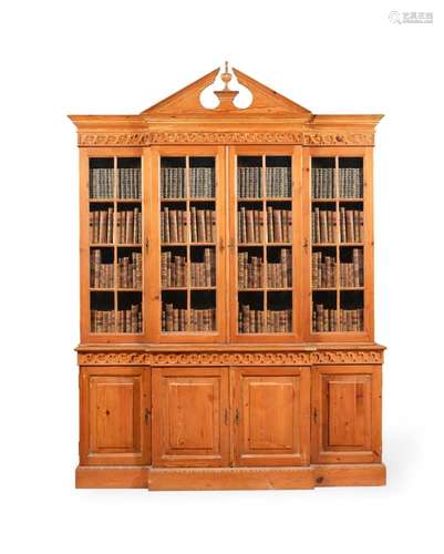 A PINE BREAKFRONT BOOKCASE, IN GEORGE II STYLE, 20TH CENTURY