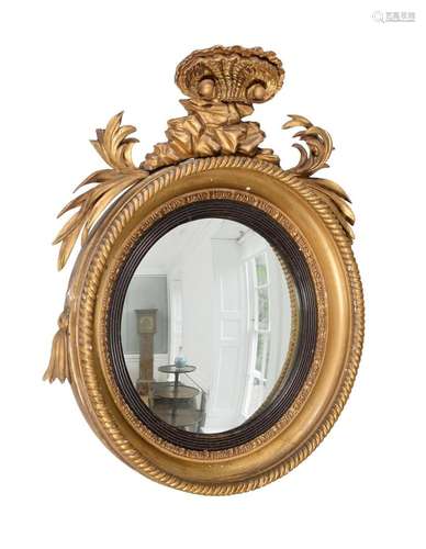 A REGENCY GILTWOOD CONVEX MIRROR, CIRCA 1815