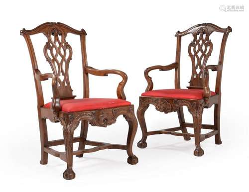 ANOTHER PAIR OF CARVED WALNUT OPEN ARMCHAIRS, PROBABLY PORTU...