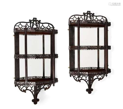 A PAIR OF MAHOGANY FRETWORK AND MIRRORED WALL SHELVES, LATE ...