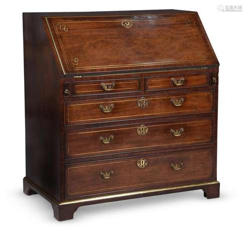 A GEORGE II MAHOGANY AND BRASS INLAID BUREAU, IN THE MANNER ...