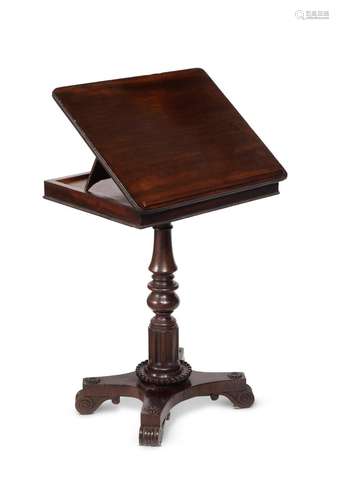 A REGENCY MAHOGANY LIBRARY READING TABLE, ATTRIBUTED TO GILL...