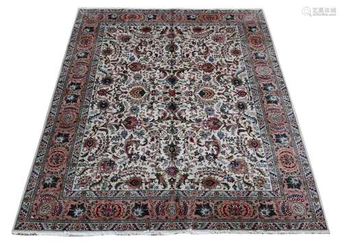 A TABRIZ CARPET, signed by Master Weaver Javan Amir Khiz, ap...