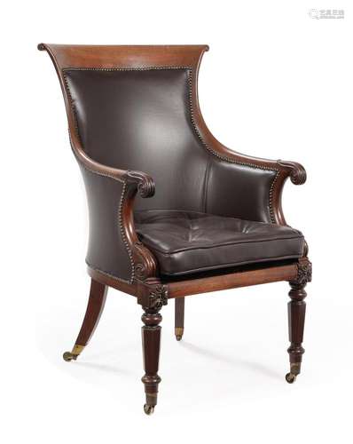 A WILLIAM IV MAHOGANY AND LEATHER UPHOLSTERED LIBRARY ARMCHA...