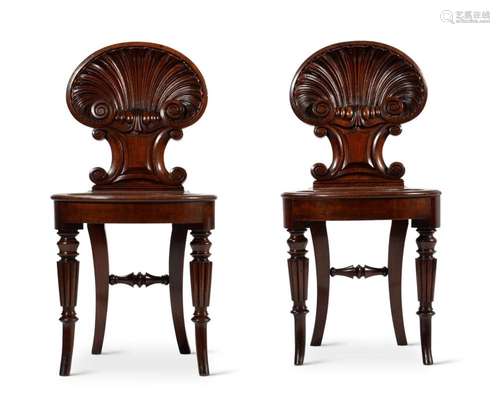 A PAIR OF REGENCY MAHOGANY HALL CHAIRS, ATTRIBUTED TO GILLOW...