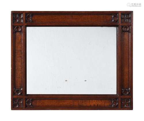 A VICTORIAN OAK WALL MIRROR, IN GOTHIC REVIVAL STYLE, SECOND...