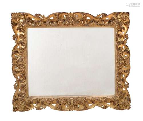 AN ITALIAN CARVED GILTWOOD WALL MIRROR, LATE 19TH CENTURY