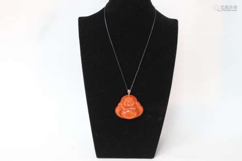 A Jadeite Buddha Pendant Necklace