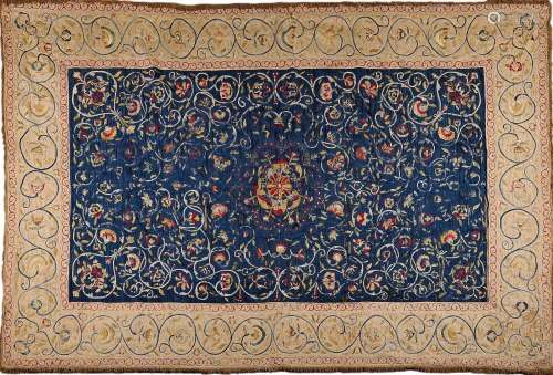 A coverlet or drapery, blue silk embroidered with polychrome...