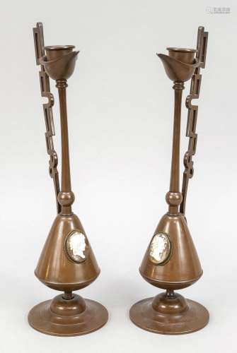 Pair of candlesticks with cameos,