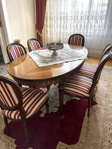 Oval dining table with six chairs,