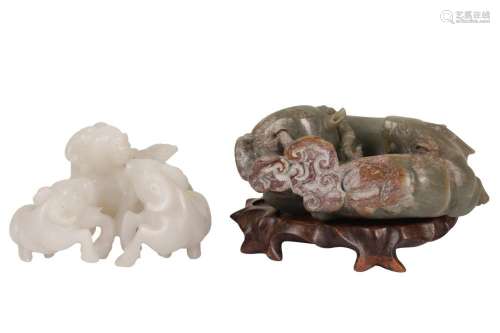 A CHINESE WHITE JADE RAM CARVING AND PALE CELADON JADE '...