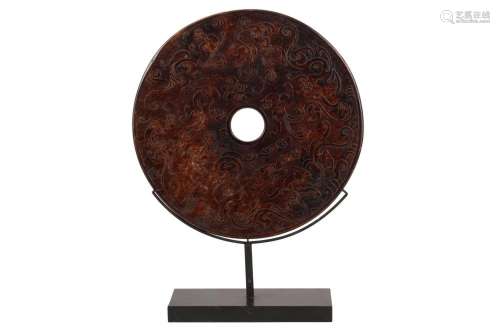 A LARGE CHINESE CARVED HARDSTONE ARCHAISTIC BI-DISC