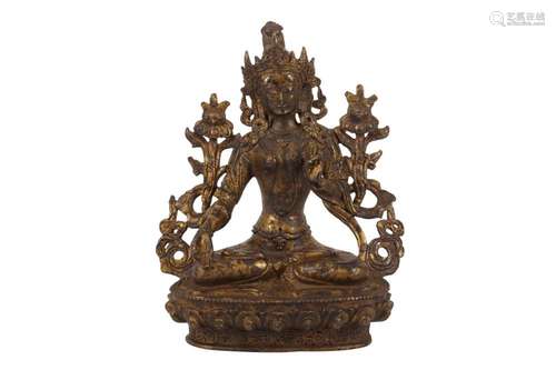 A TIBETAN GILT METAL FIGURE OF TARA