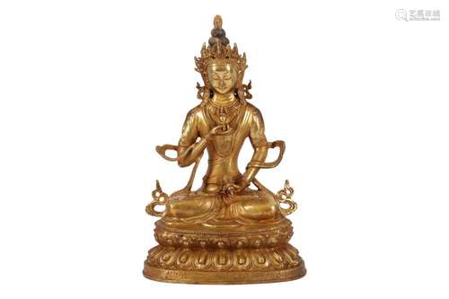 A TIBETAN GILT METAL FIGURE OF TARA