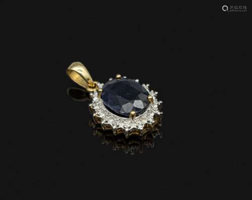 14 kt gold pendant with sapphire and diamonds