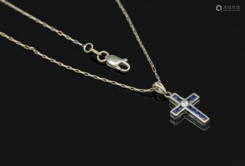 18 kt gold crosspendant with brilliant and sapphires