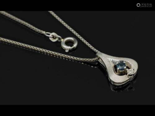 14 kt gold pendant with sapphire and diamond