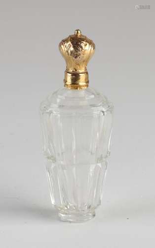 Odeur bottle with golden cap