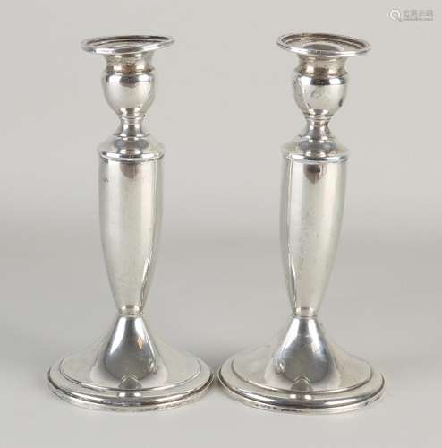 Two silver candlesticks