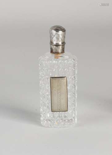 Bottle with silver cap