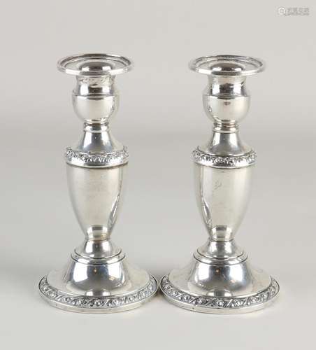 Two silver candlesticks