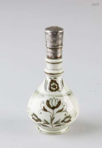 Bottle with silver cap