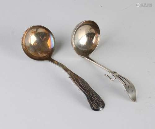 2 silver cream spoons