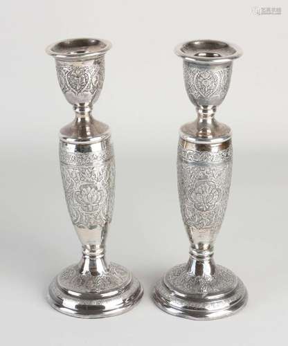 2 silver candlesticks