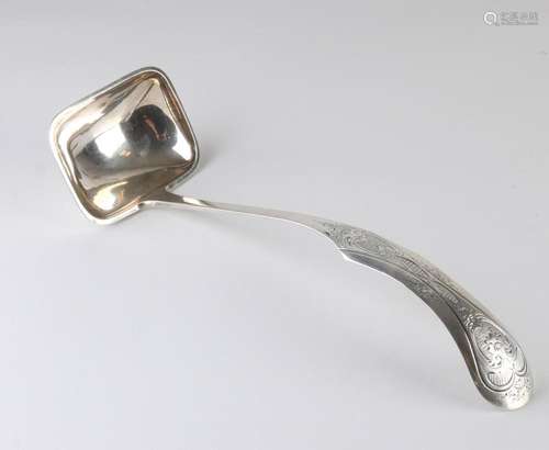 Silver serving spoon