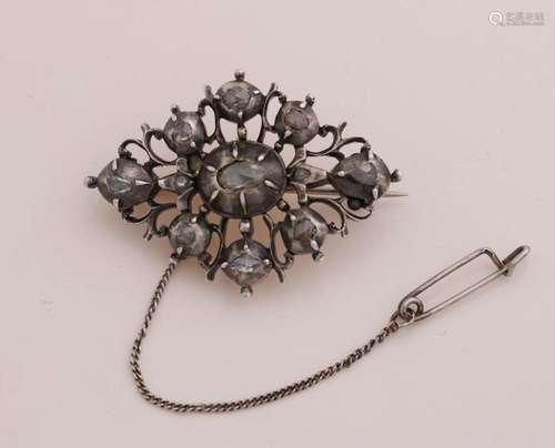 Silver brooch with diamonds