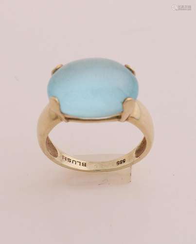 Gold ring with blue stone