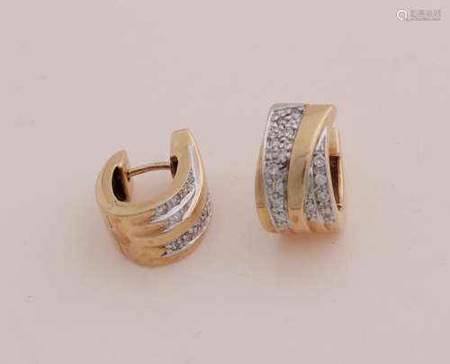 Gold creoles with diamonds