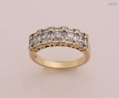 Gold ring with diamond/baquette