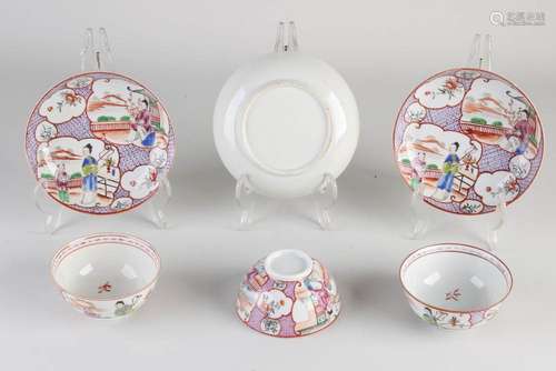 Three Chinese cups and saucers