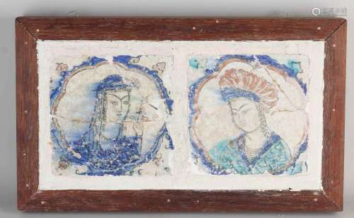 Two antique Persian tiles in frame