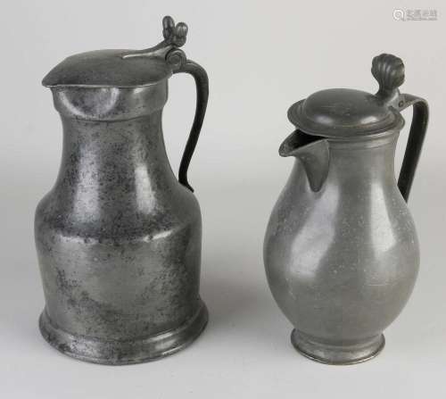 Two antique pewter pitchers