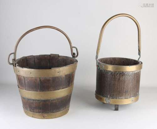 Two antique oak buckets, 1900