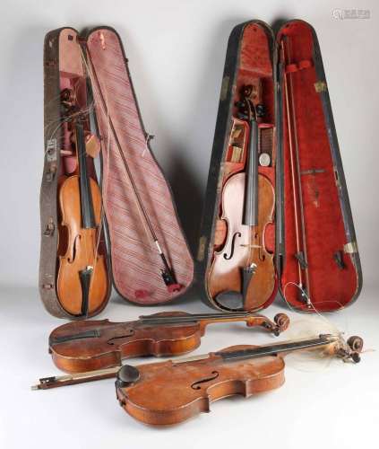 Four old/antique violins
